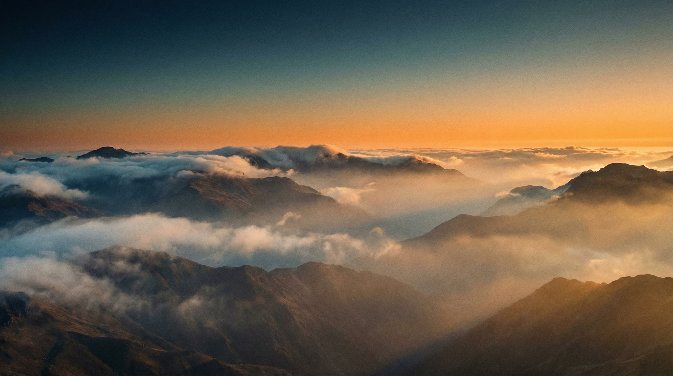WAIMAKERS — atmospheric mountain landscape at golden hour